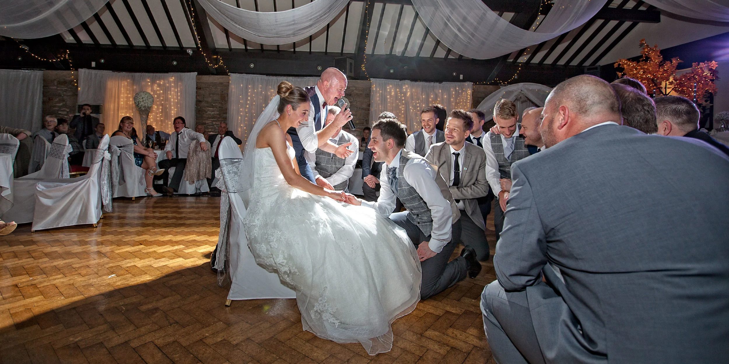 Bride serenaded by the Groom and groomsmen at the Best Western Mytton Fold Hotel in Whalley,images by Avanti Photography based in Lancashire 