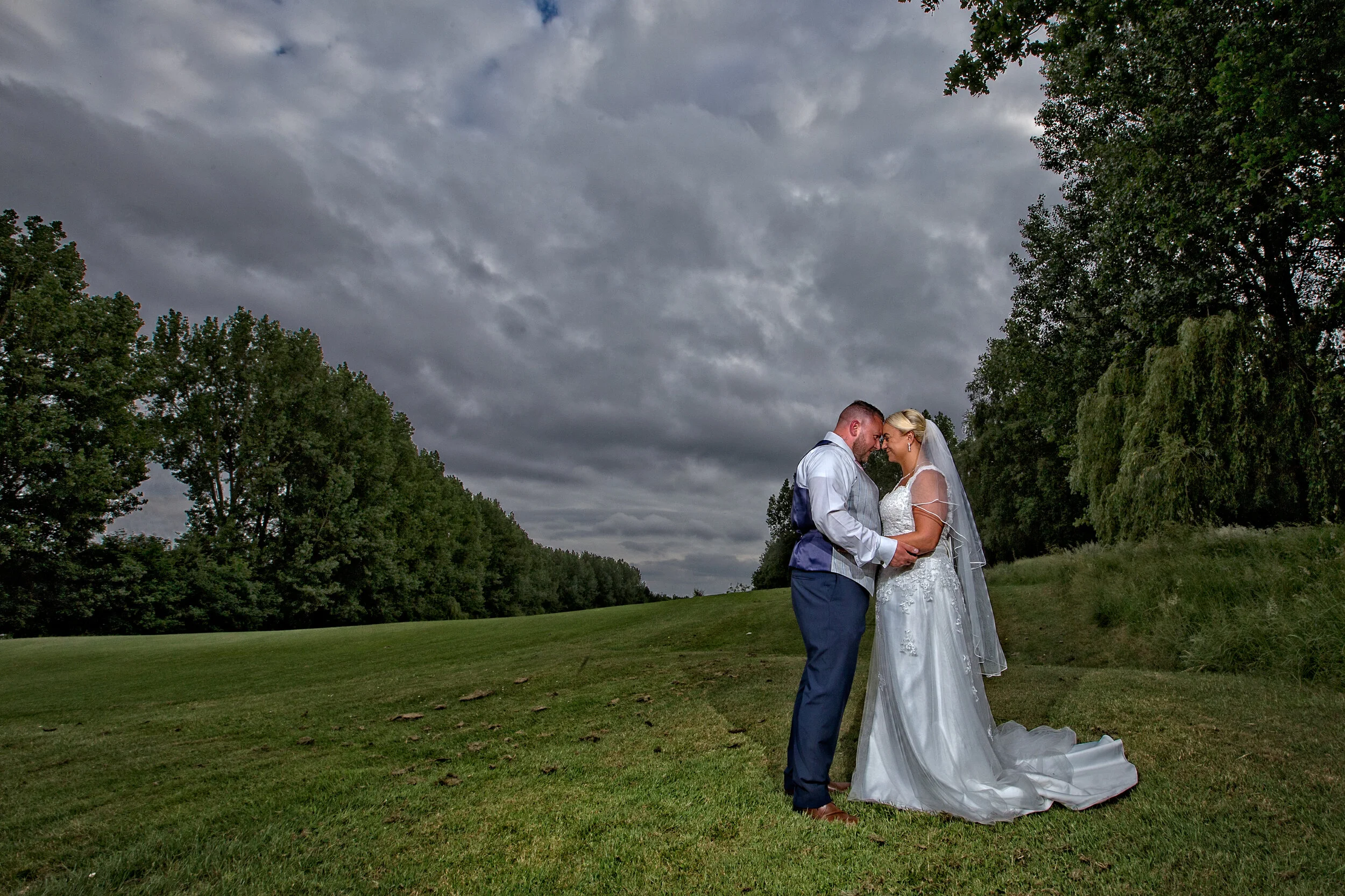 Newlyweds on golf course/ Bride and groom's picture taken on Prestwich Golf Course next to their wedding venue.#avanti photography #weddings in Manchester