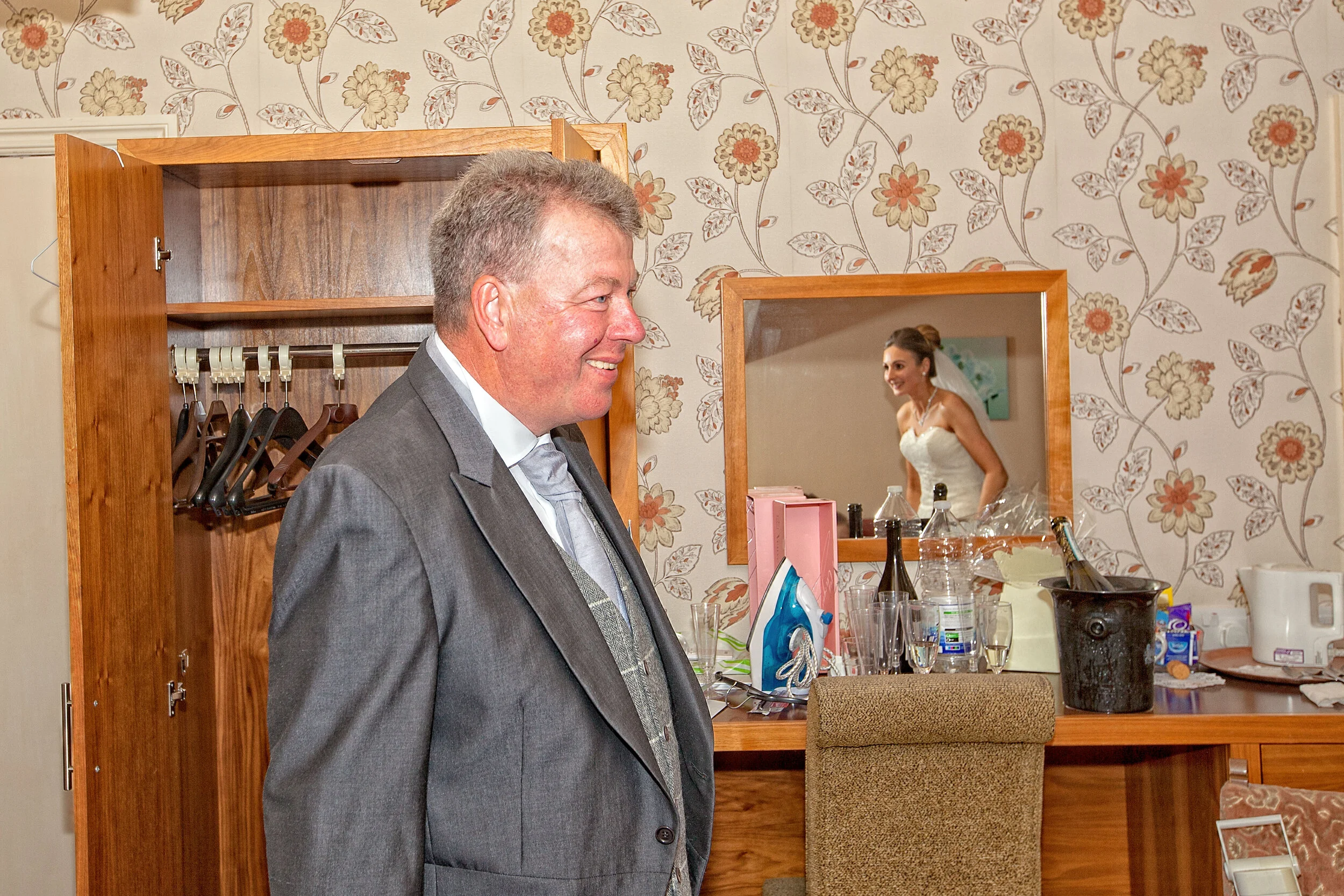 Father of the brides first glimpse/ end of bridal prep in the Mytton Fold Hotel.Images by Avanti