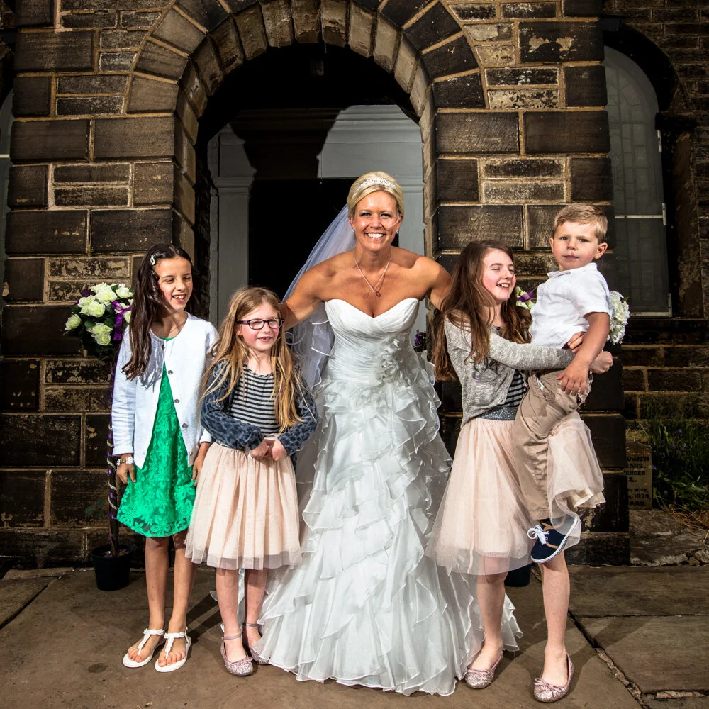 Beautiful bride outside Haslingden church /photography by Avanti