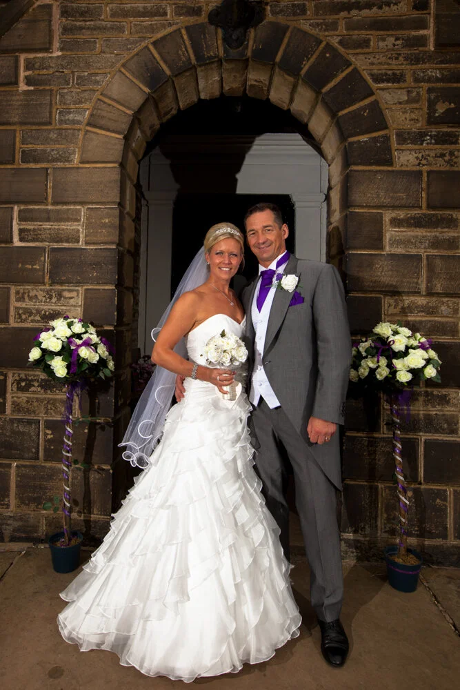 Bride and groom outside  Haslingden church after getting married/ photography by Avanti