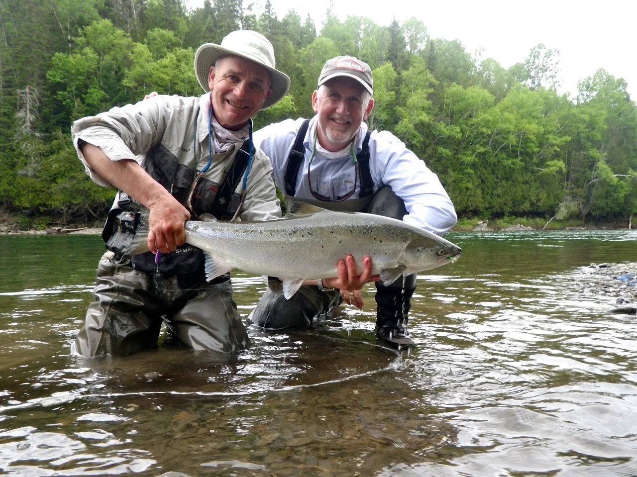 Photographer Tosh Brown with Camp Bonaventure guide Bruno LePage. This is Tosh's first Atlantic Salmon, Congratulations!