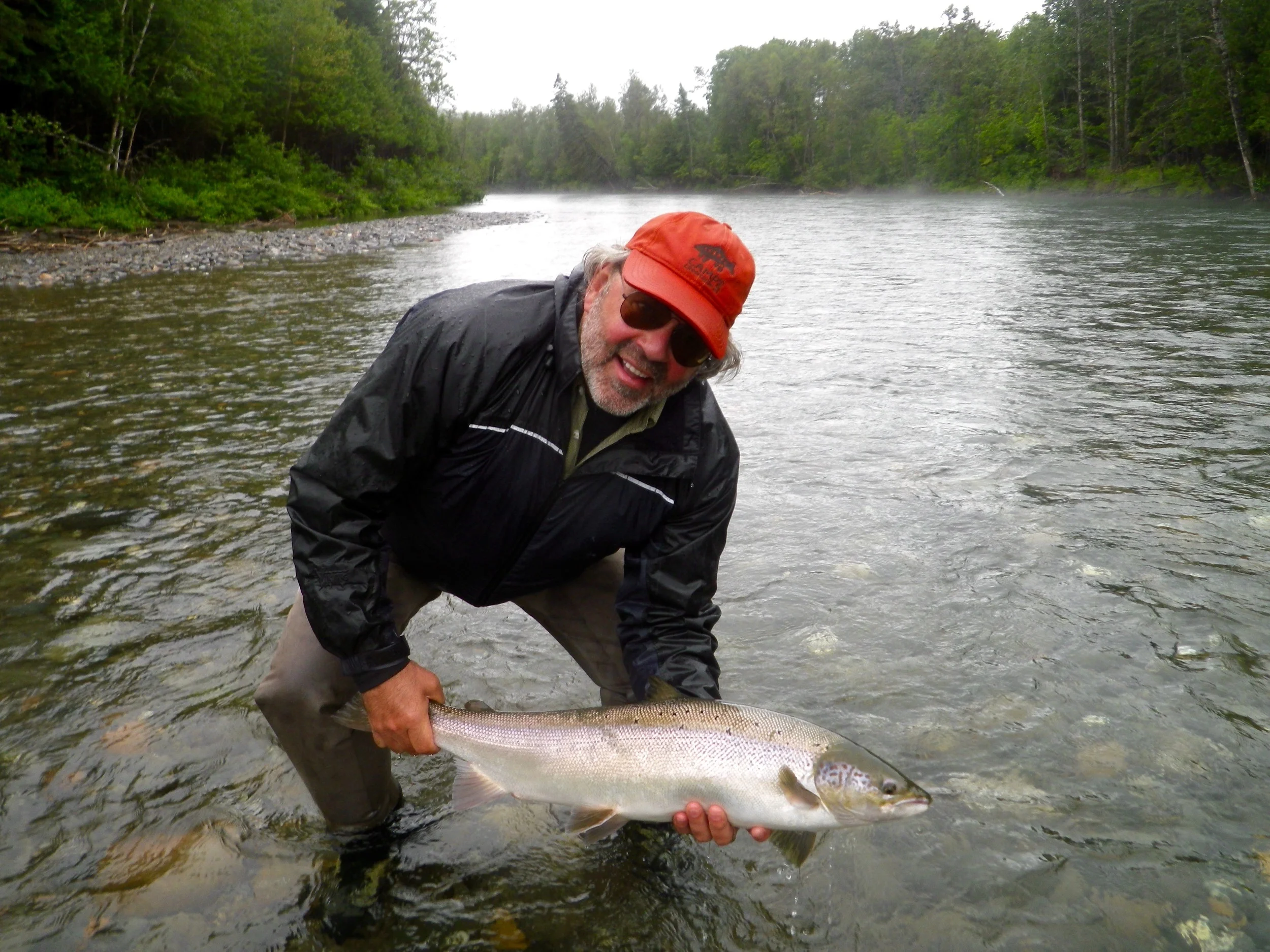 Long time Camp Bonaventure guest Glenn Munro lands a nice one on the Bonaventure, Nice fish Glenn. 