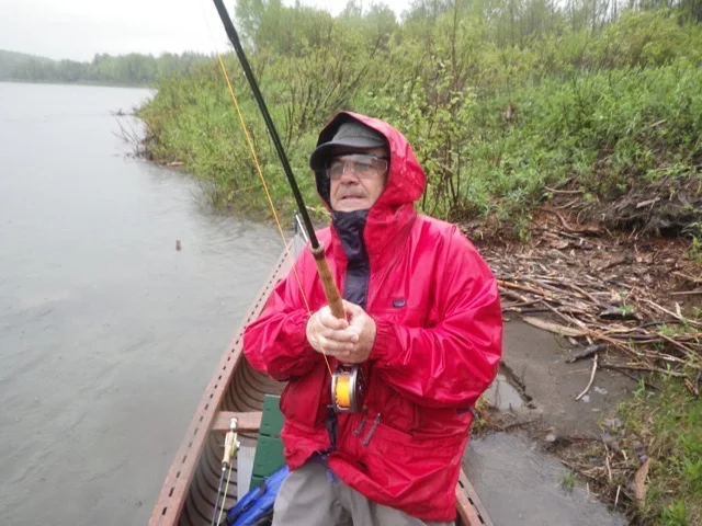 Stefano from Italy plays his first Atlantic salmon in the rain on Wednesday.