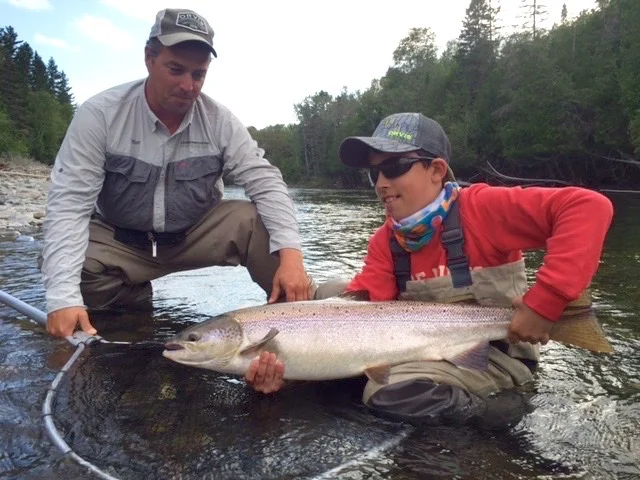 Teo Panzer is only nine years old but this is his 3rd trip to Camp Bonaventure. Here he is with guide Mathew Flowers, and a Nice salmon, way to go Teo!