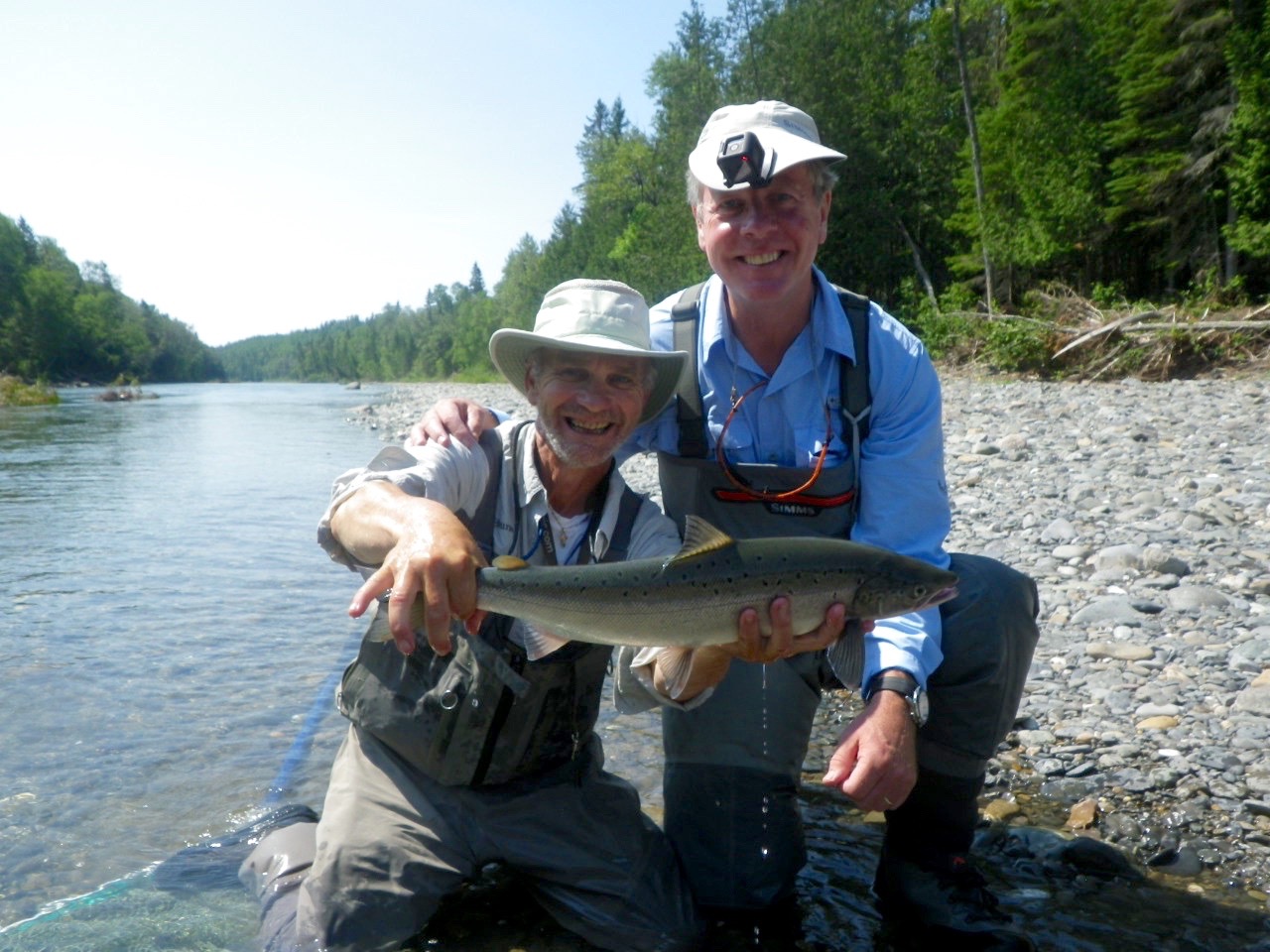 Eric Forgie (Right) with Camp Bonaventure Guide Bruno LePage, this was Eric's first on a dry fly1, Nicely done !