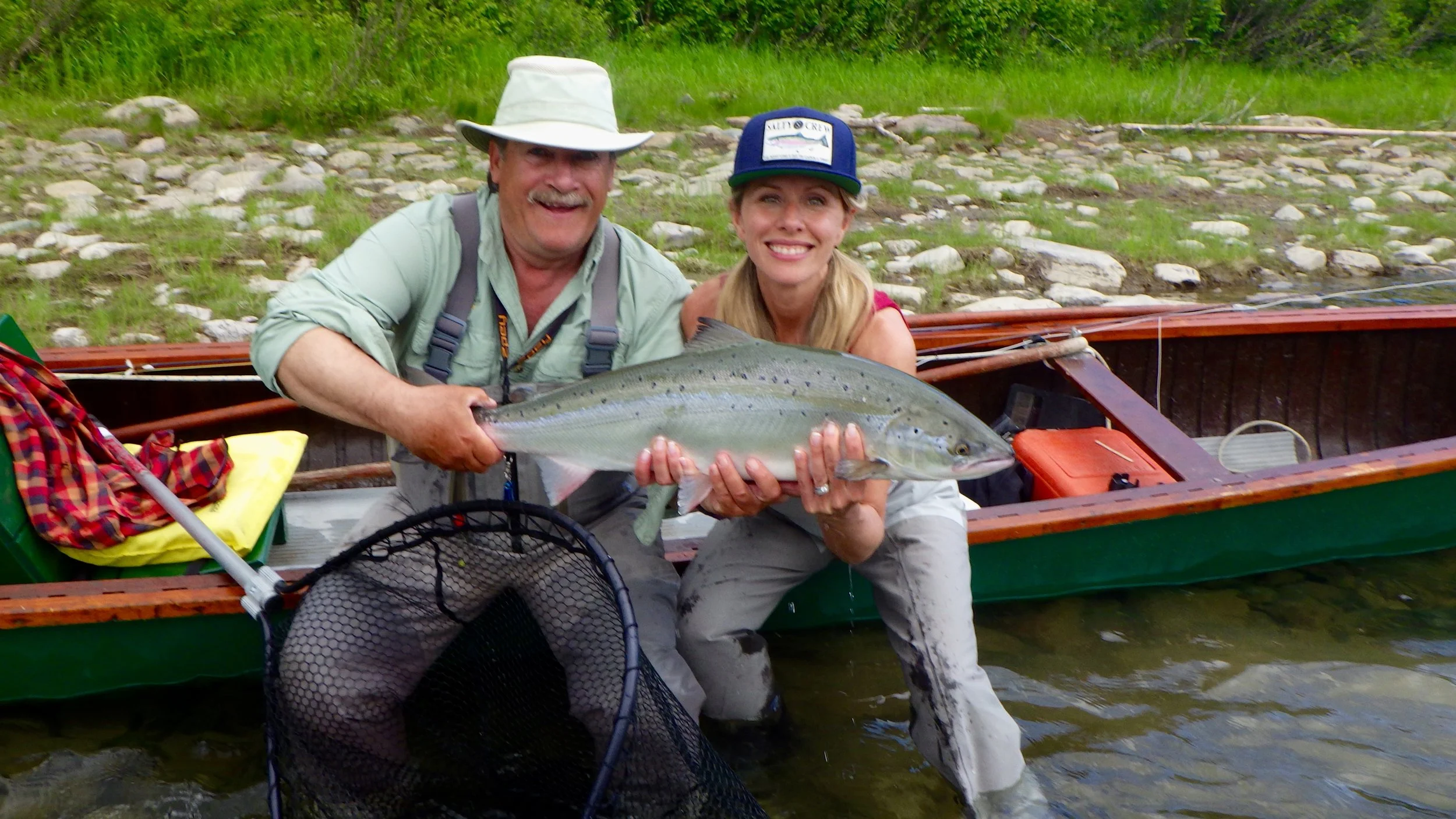 Congratulations to Patricia LePage who caught this fine salmon under the watchful eye of our head guide Mario Poirier. nice one Patricia.