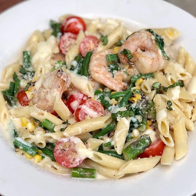 dinner special!!! laura&rsquo;s LEGENDARY &ldquo;spring penne.&rdquo; fresh corn, asparagus, haricot vert, cherry tomatoes and grilled shrimp in a lemony buerre blanc

first time i had this dish was ten years ago at kevin&rsquo;s thyme where she was 