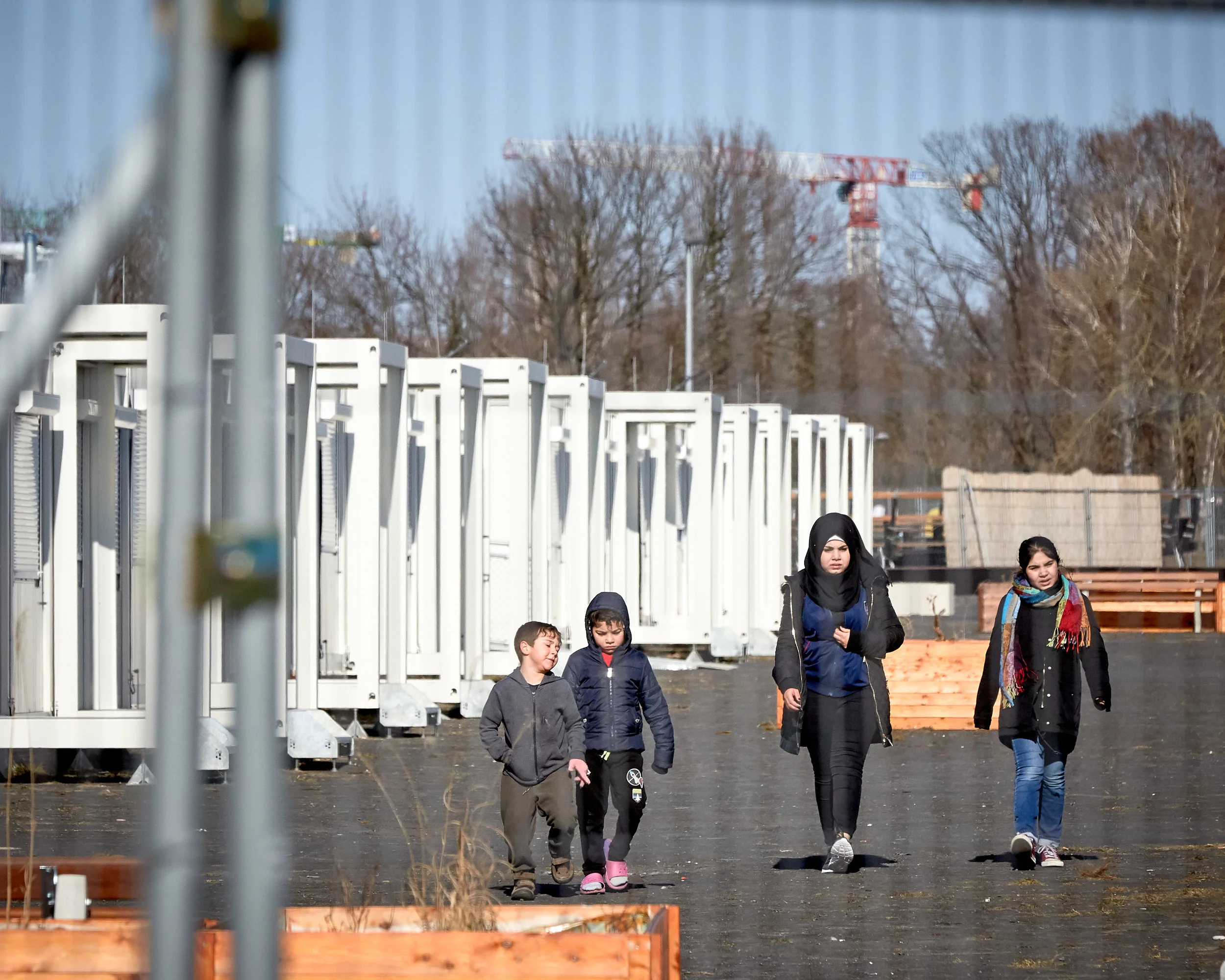 Nearly 500 refugees have been given temporary housing in a container village at the site of Berlin's former Tempelhof Airport