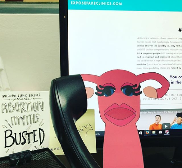 Feminist Flag Corps in Columbus, Ohio had fun with Eunice P. Justice, America's uterus, while they reviewed fake clinics online.