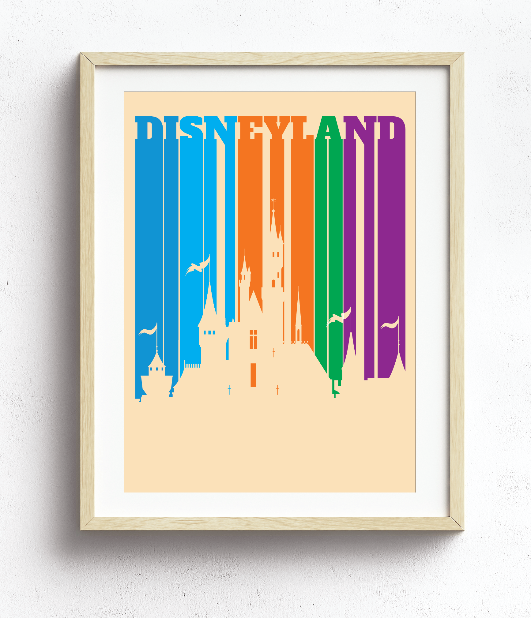 Disneyland Letters in Bold Colors form stripes that reveal Sleeping Beauty Castle Silhouette