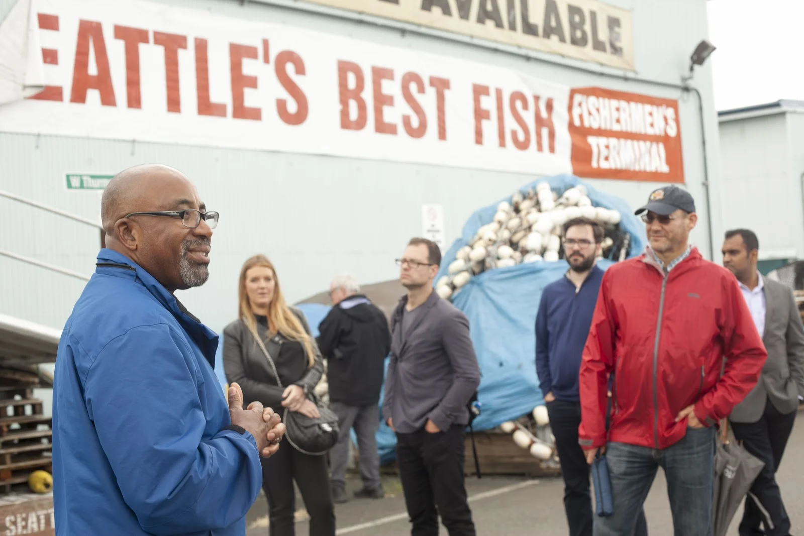 Delmas Whittaker speaking to the group at the Port of Seattle . Photo by Marina Piedade, Van Alen