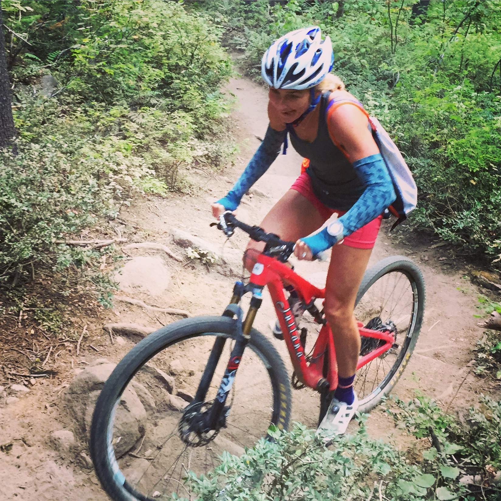 It's all fun and trail games until you bust a hole in the side wall of your tire. Lauren Fleshman is one tough chick!