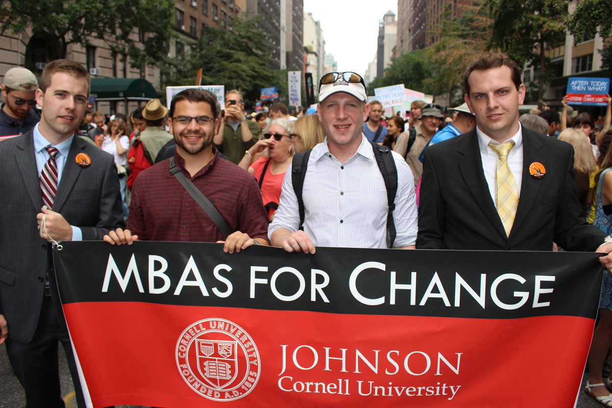 Jeremy Kuhre, left, organized a group to attend the People's Climate March