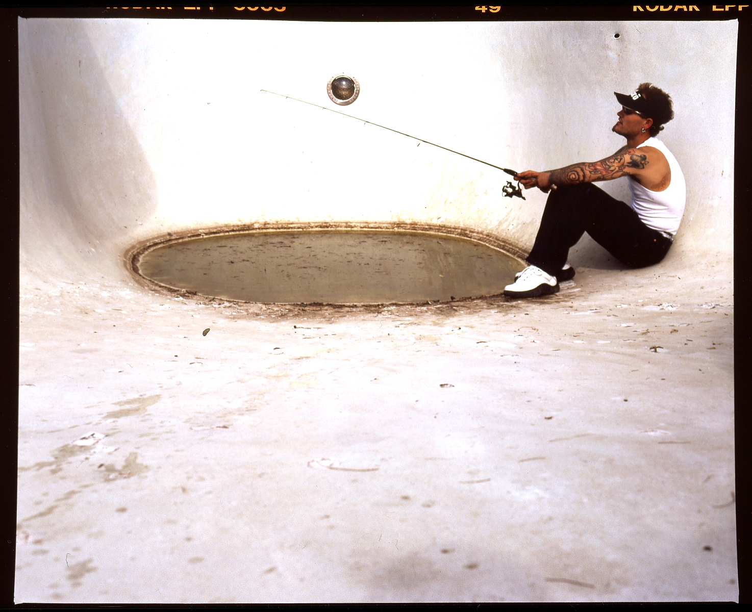 Mike in Pool Fishing.JPG