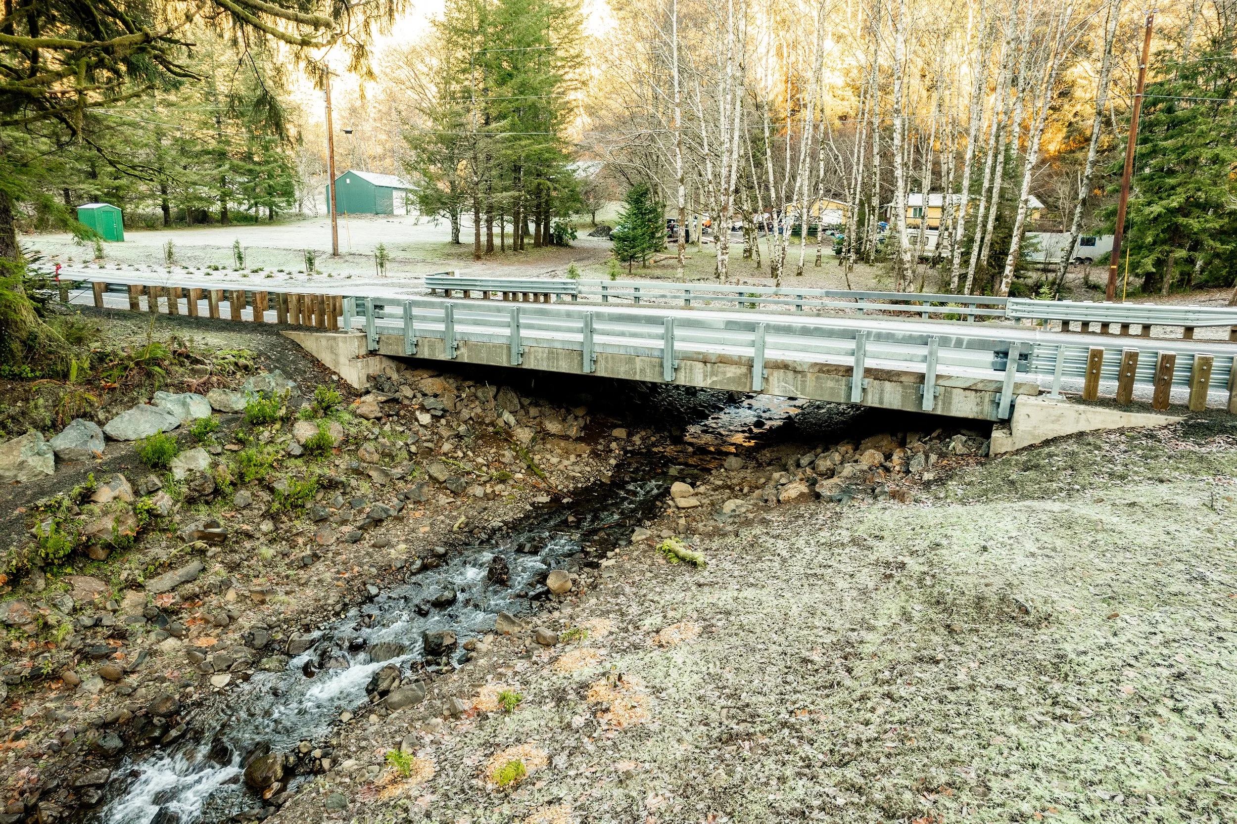The undersized culvert was removed and replaced with a 46' clear span bridge, restoring 1.3 miles of upstream spawning and rearing habitat.