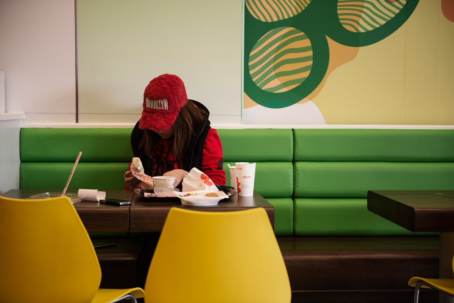 A Foxconn worker at a fast food restaurant during a day off..