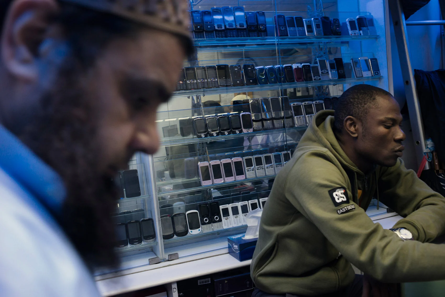 At the Chungking Mansions, in a store ran by a Pakistani businessman, an African trader is selecting mobile phones. He is planning to ship 2000 mobile phones to Douala, his ometown and the capital of Cameroon..