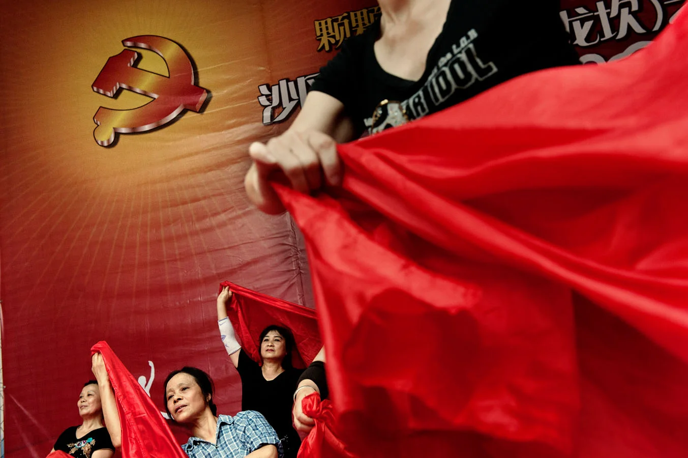 Volunteers rehearsing a revolutionary ballet in Chongqing during a campaign celebrating Mao and the revolution, initiated by local Party Secretary Bo Xilai in a bid to foster his image and popularity. Bo Xilai was subsequently arrested and condemend for corruption. 