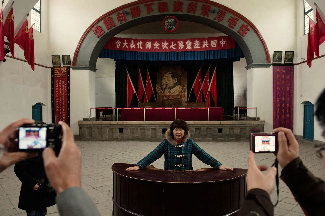 Tourists visiting Yangjialing Assembly Hall in Yan'An, from where Mao Zedong launched one of the Chinese Communist party first purge (the rectification campaign) and asserted his power as the sole leader of the Party.