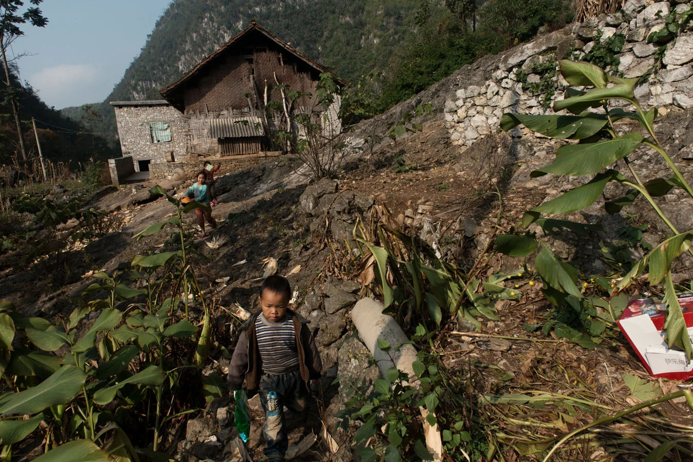 Ting Fen, Ting Rui and Yang Tian Mei, on their way to wash the household laundry on a day she and his siblings were left alone at home. 
