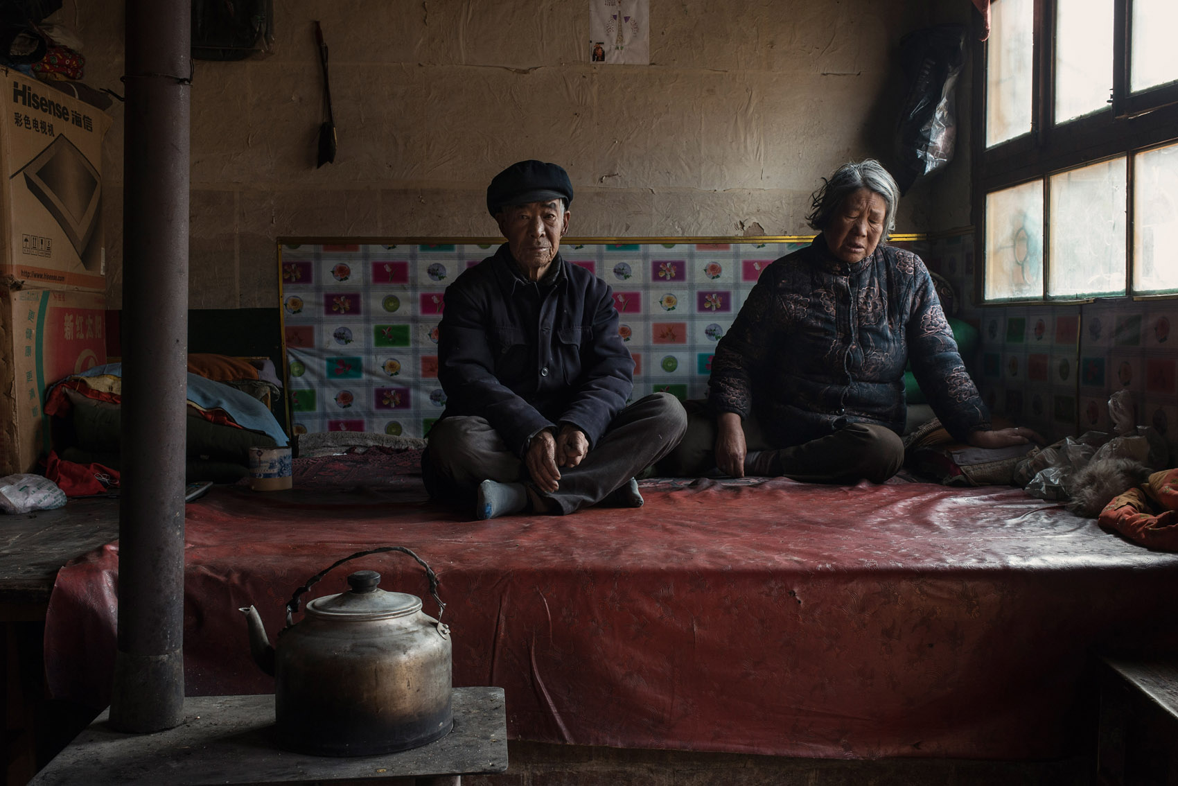 Baituo village 72 years old Yao Gouwa, with his wife, Liu Yinxiang, also 72. She is pain from hypertension. Liu is in pain from hypertension, a very common affliction among elders in the region.