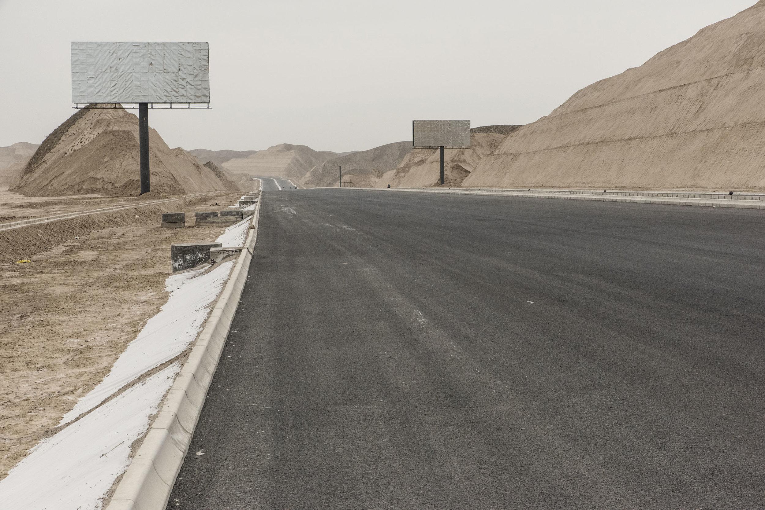 A ring road under construction in Lanzhou New Area, a city built from scratch in Gansu Province.