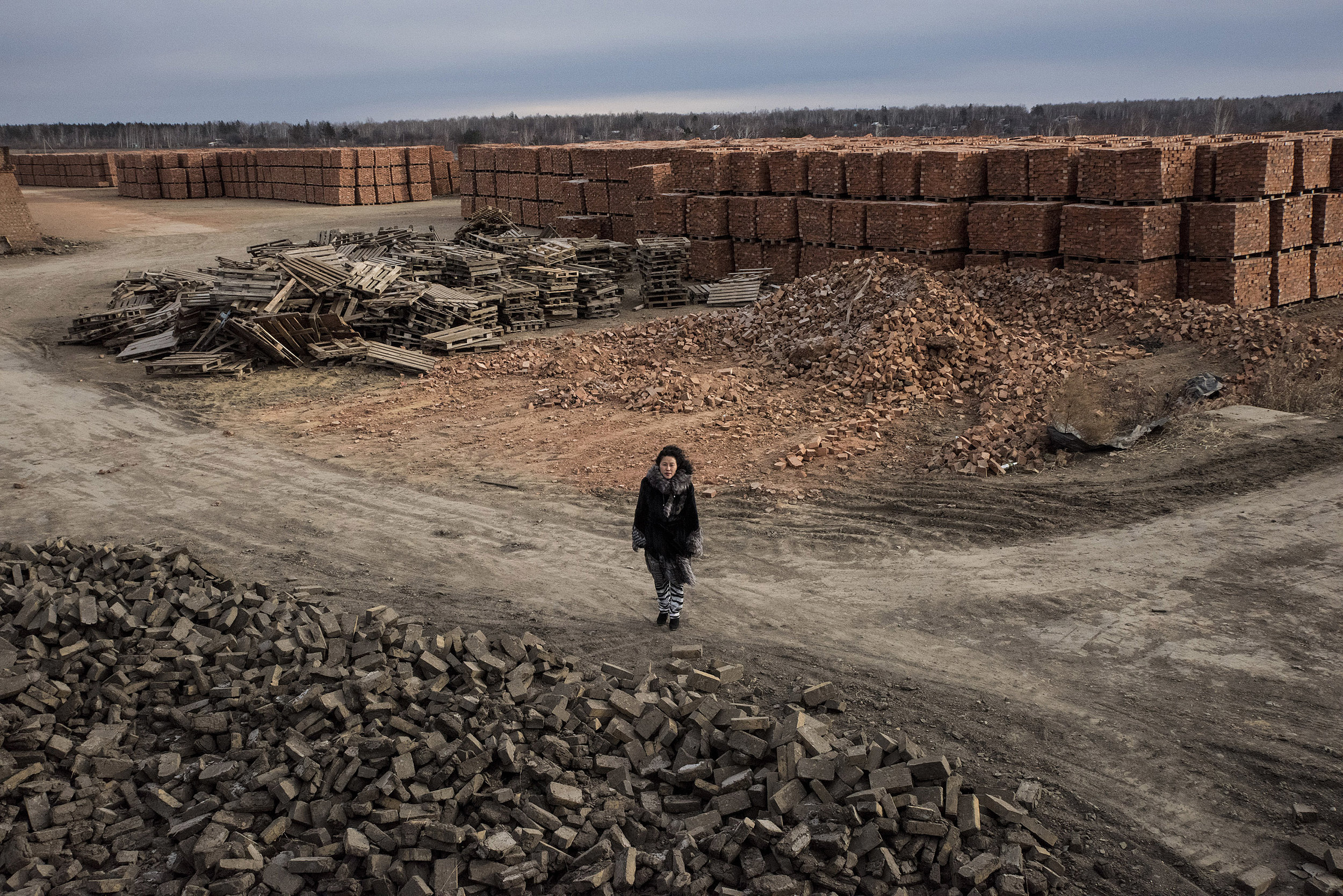  Li Lihua, a Chinese woman doing business in the Russian federation standing in a brick factory, one of four she owns in Blagoveshchensk.&nbsp;(For New York Times) 