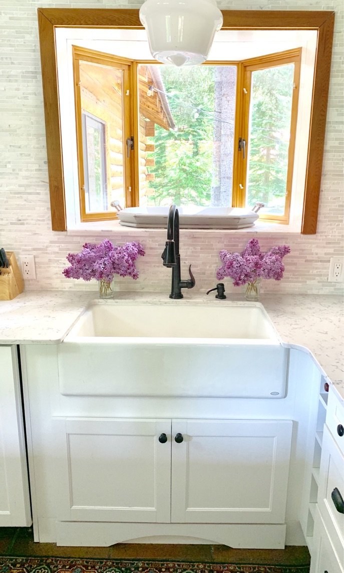 lilacs at sink.jpeg