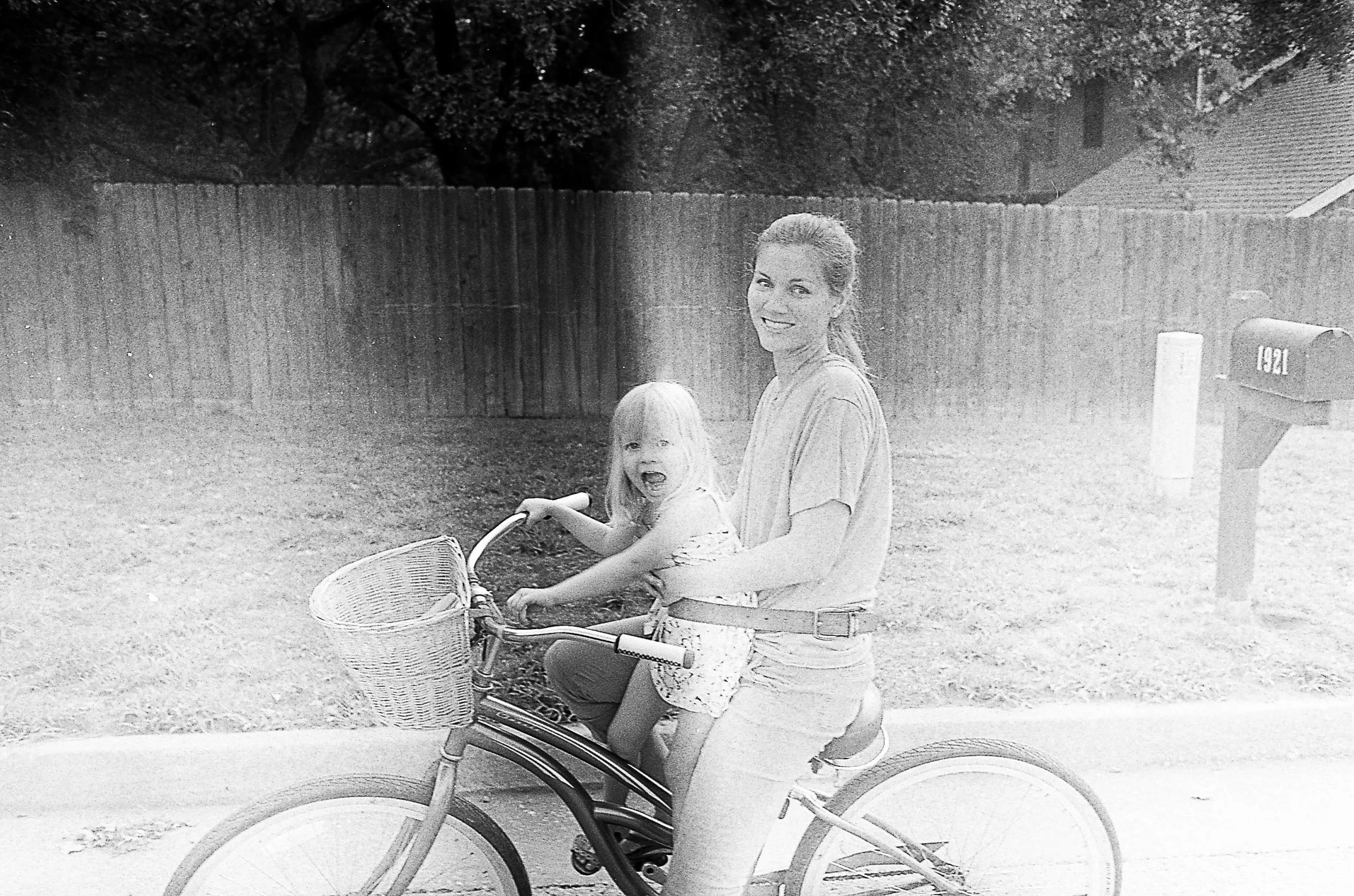 The girls have really taken to bike riding (yes!), but our youngest is still too tiny to pedal well on her own. I asked my husband for his belt and came up with this fun little contraption. He was not pleased, but she sure was and hey, it got us around the block before the sun completely set :-)