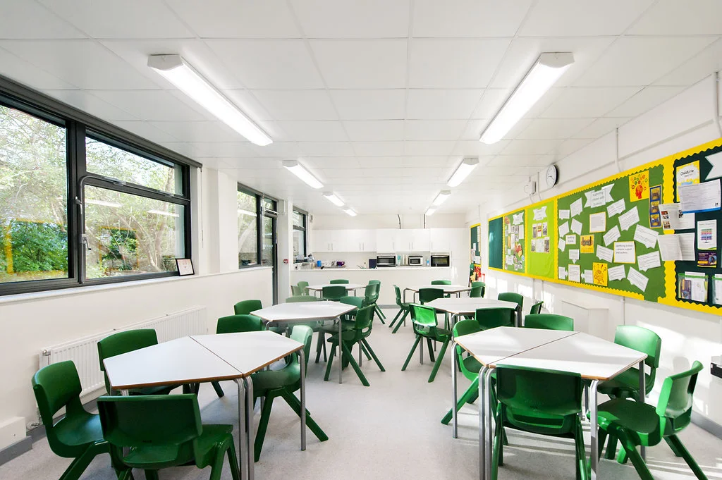 LARGE MEETING AREA : KITCHEN, interactive whiteboard, movable tables, and seating for up to 30 people.