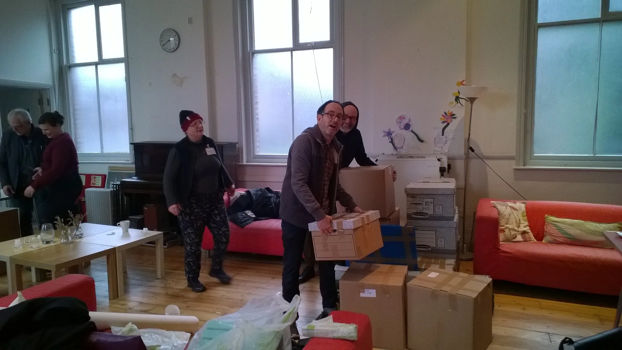 David, Alexis, Roberta, Andy and Wayne shifting boxes