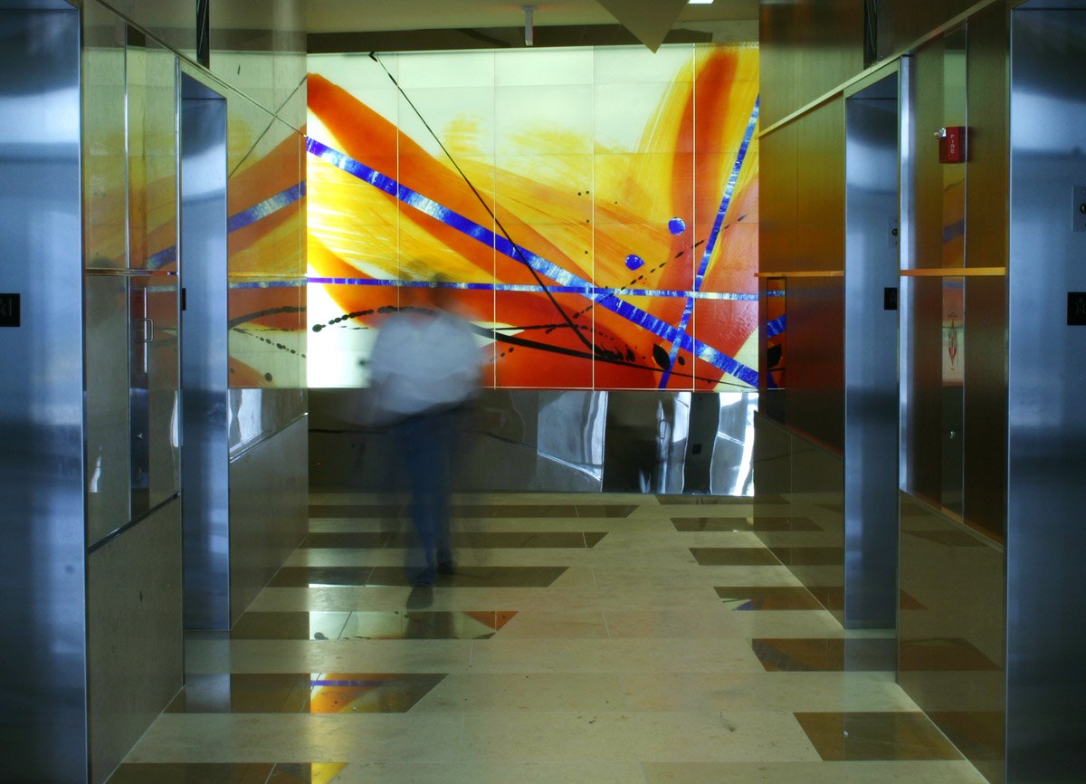 corporate lobby backlit art glass wall