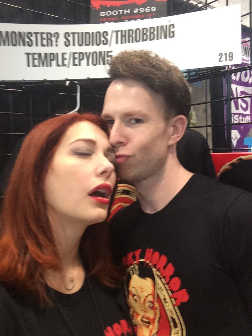 Laura (Co-Producer) seeks love and naps from Shawn while manning the booth the last day of NYCC '14