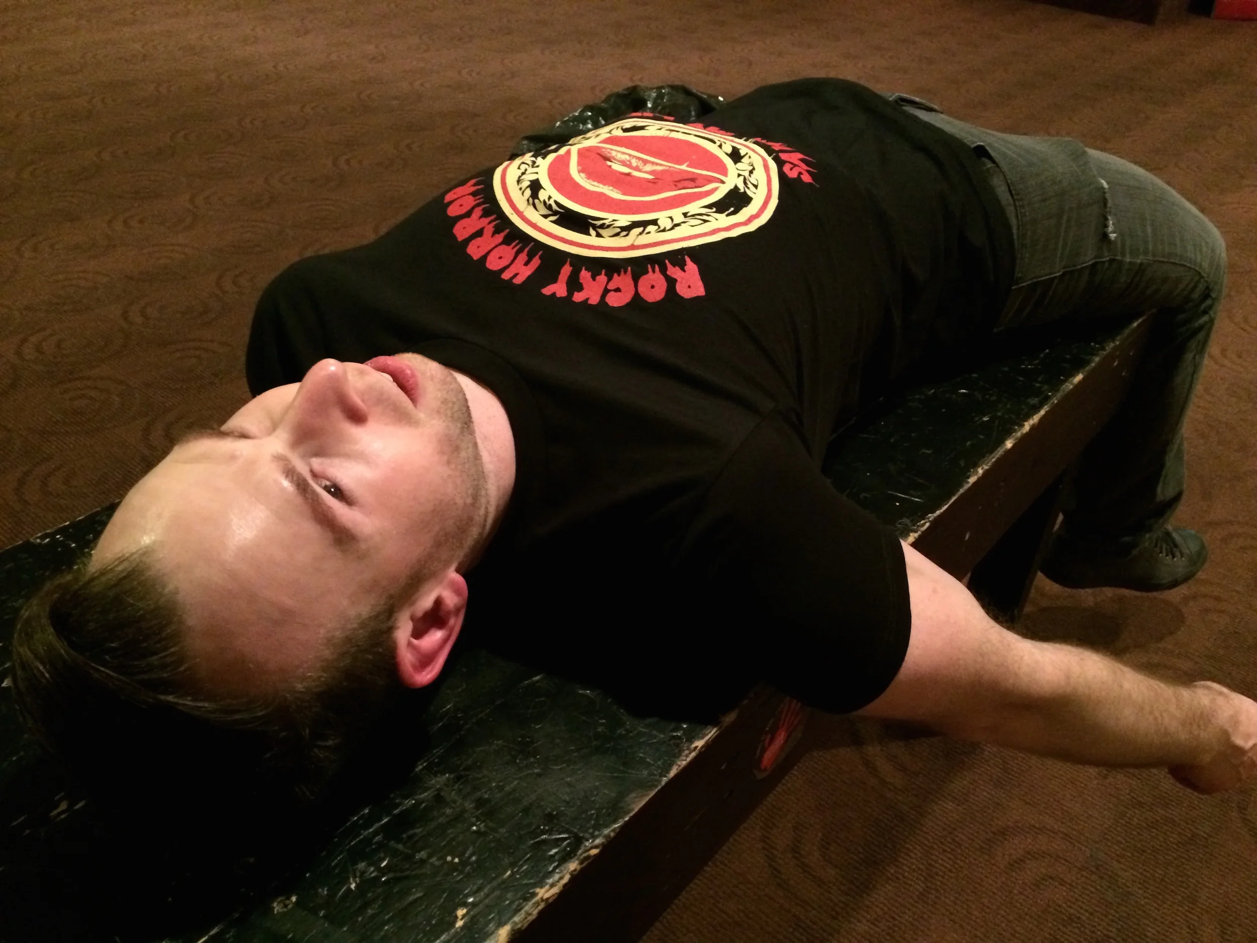 Shawn taking a quick break during The NYC Cast's show after a long day