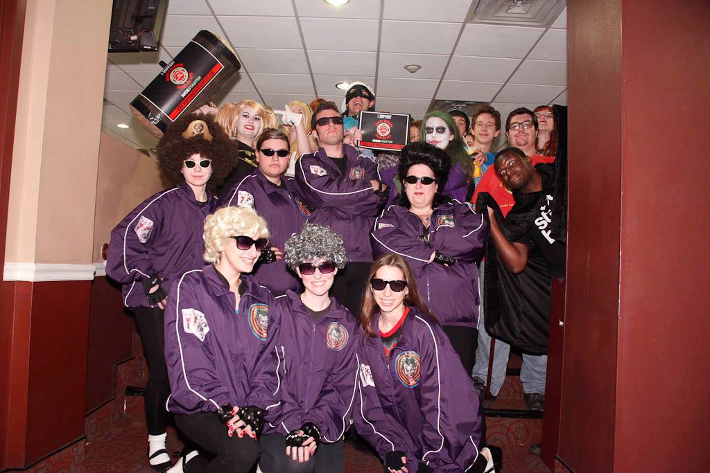 Dana (Production Design) posing with the Transylvanian "Joker's goons" cast members at The Home of Happiness' Super Hero Theme night who show their support for RHSML Photo credit to Michael Hambel Photography