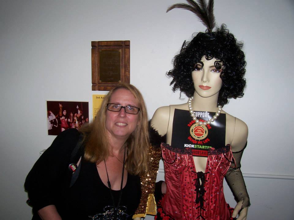 Lisa Kurtz Sutton with the original 1978 costume of the late D. Garrett Gafford -- from the Tiffany Theater .