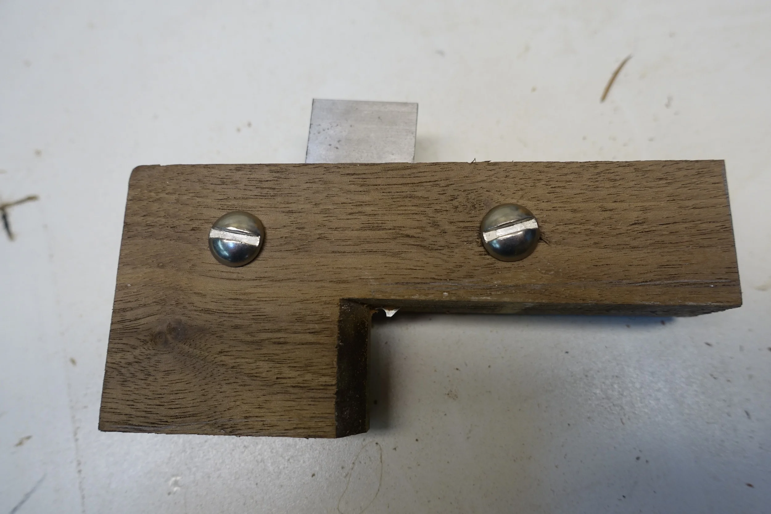 Shown without the "bed" relief bevel for shaving clearance