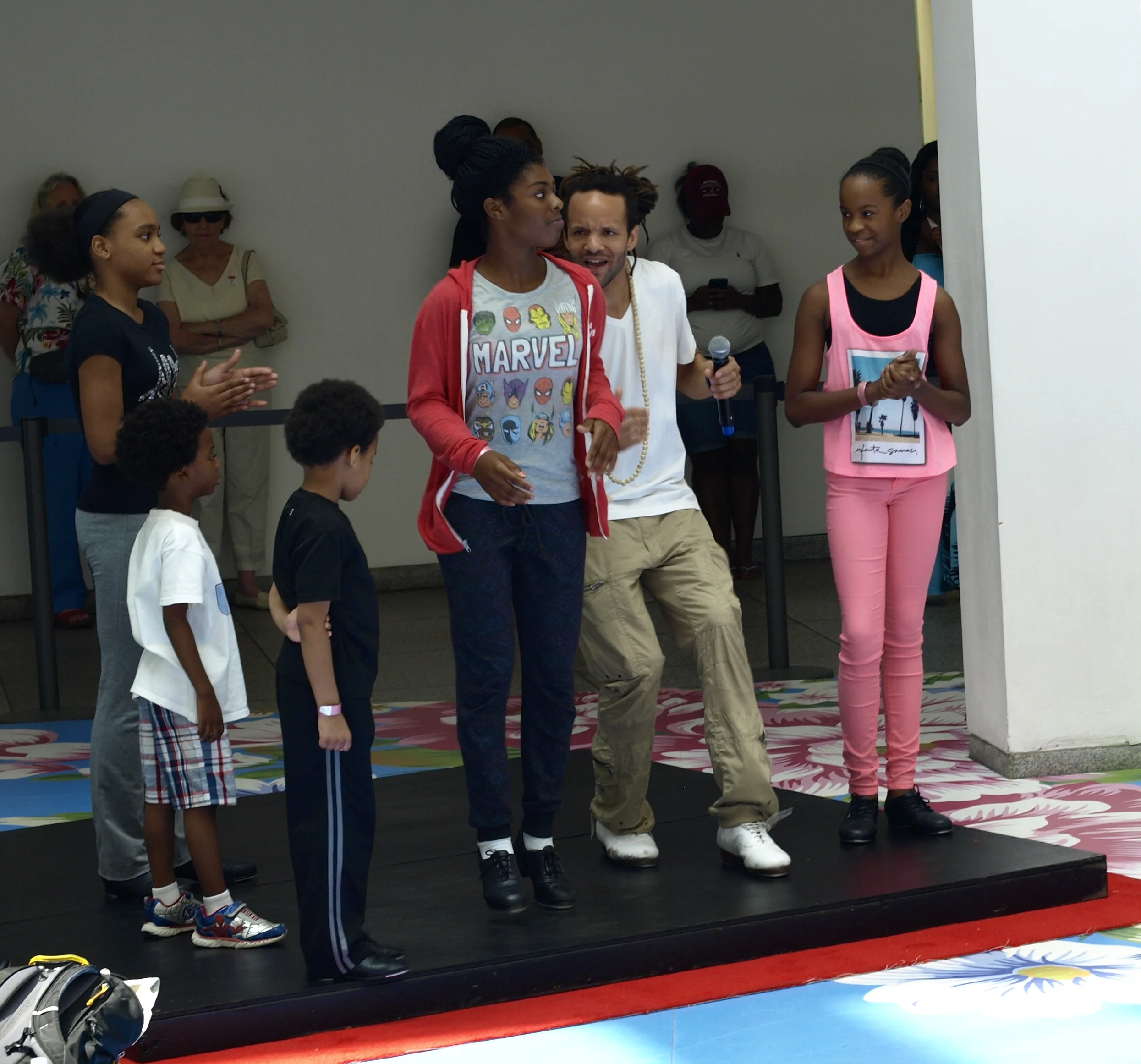 Savion Glover and a young lady rapped with their feet.