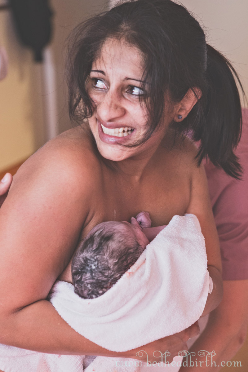 How beautiful is this mom? Her face is priceless and I am truly in love with this shot from Nikki at Bed Head Birth. 