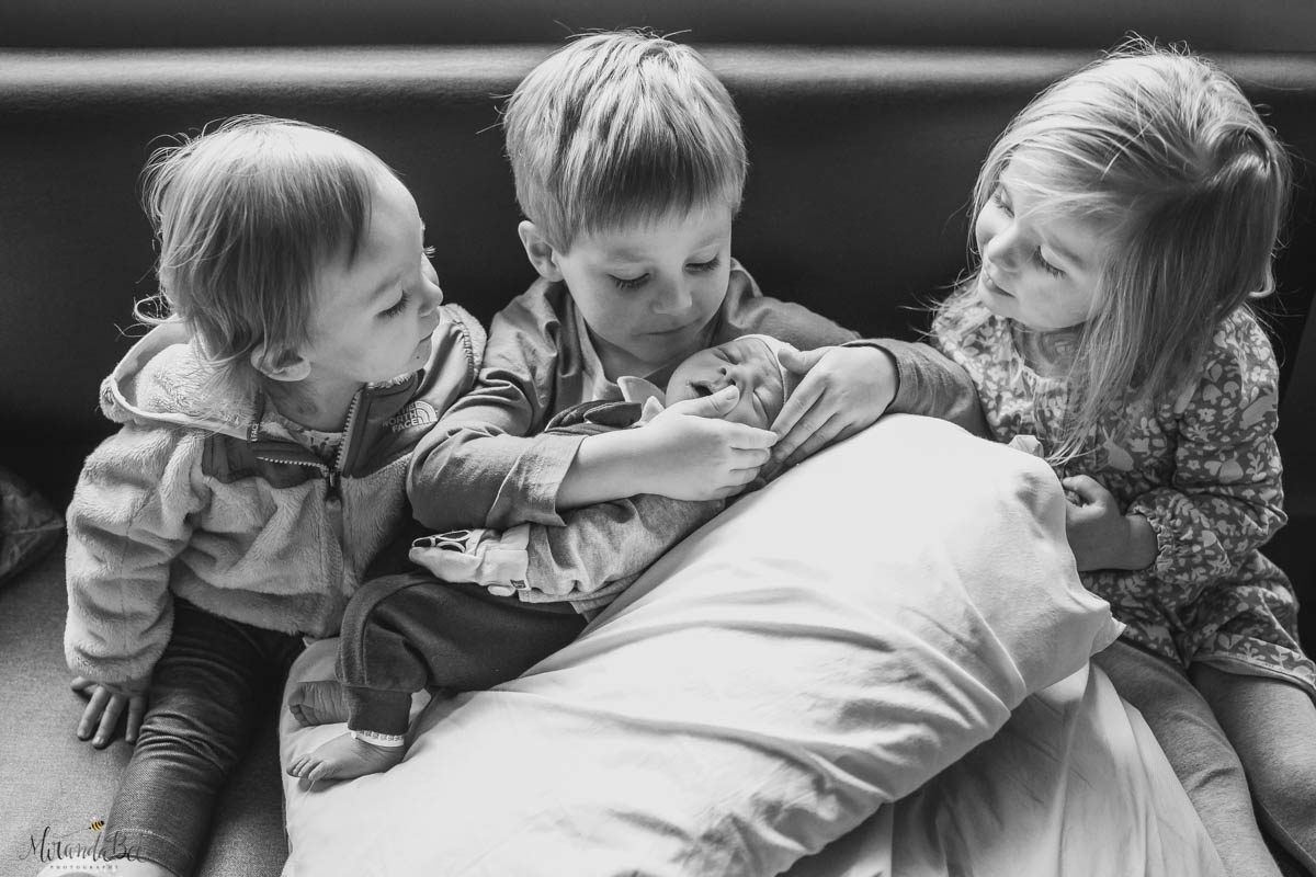 Baby with siblings
