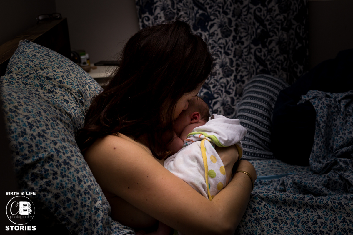 Mom holds baby