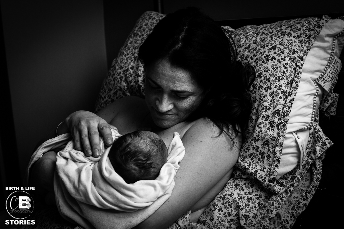 Mom admires baby