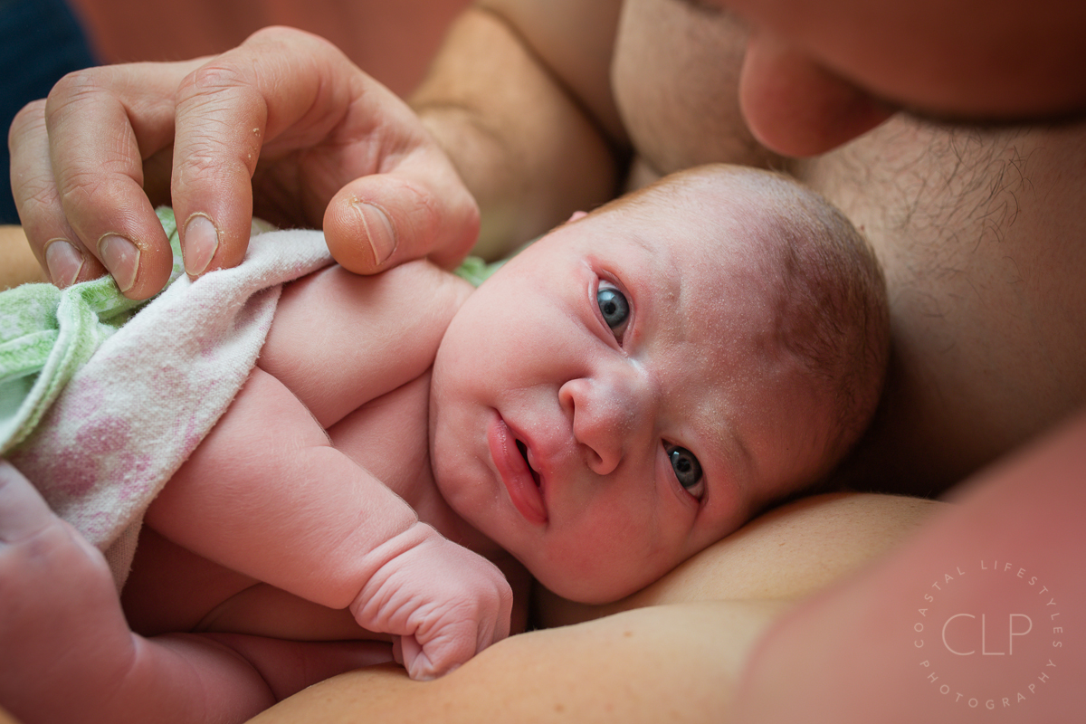 Wide eyed newborn