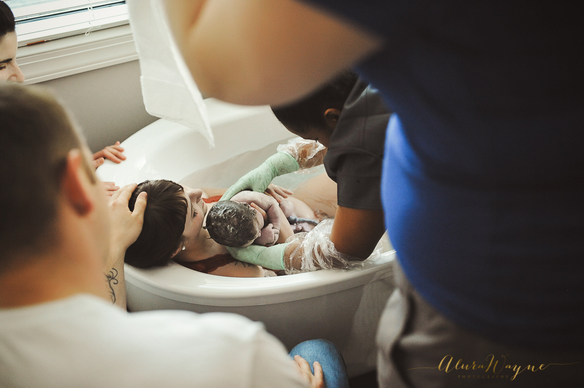 Midwife delivers baby