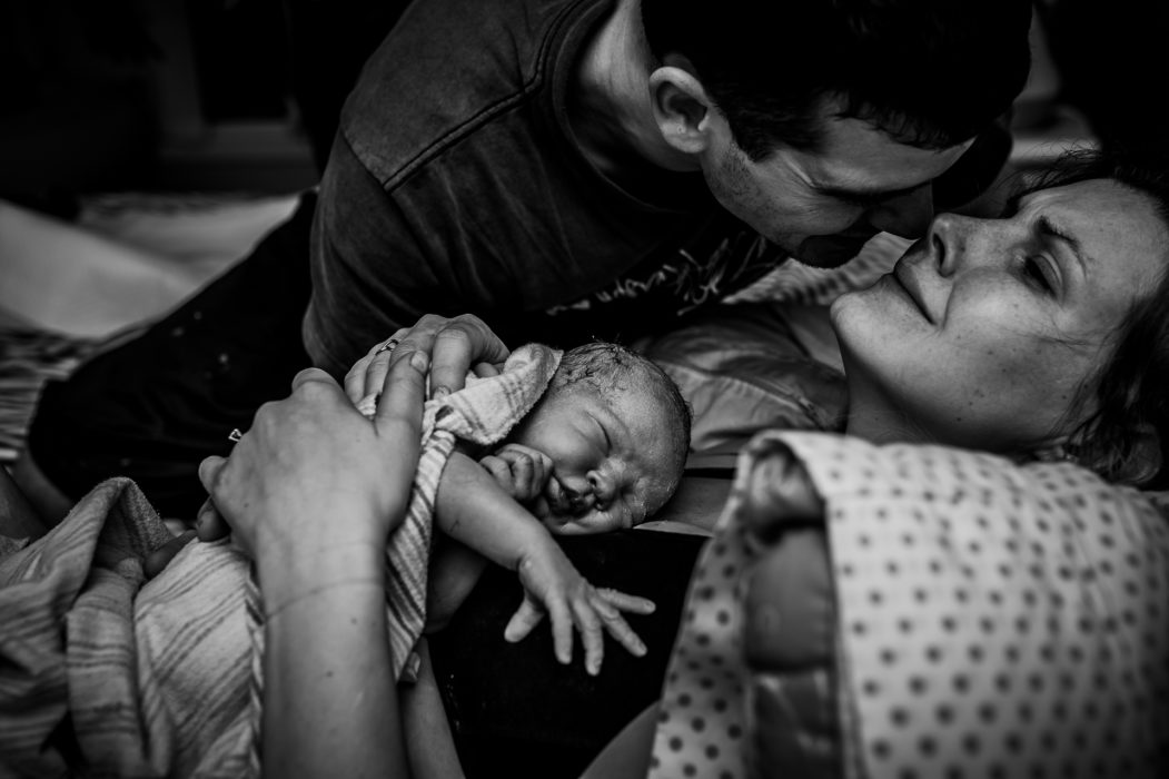 "Admiration and Relief" by Kandyce Joeline This photo is not only a wonderful black and white conversion, but it tells a story, the composition is wonderful and its PACKED full of emotion! 