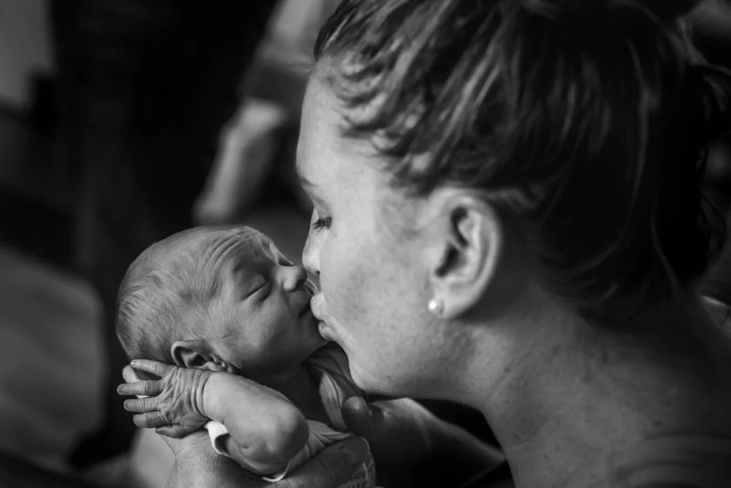 "The Greatest Feeling" by Kelly Manweiler The wrinkly forehead and closed eyes of that baby, and then the mama kiss. Ahhhhhhh......lovelovelove! I remember that wrinkly forehead and sleepy expression. I gave my babies ALL the kisses. This takes me right back to postpartum. I freaking love it. 