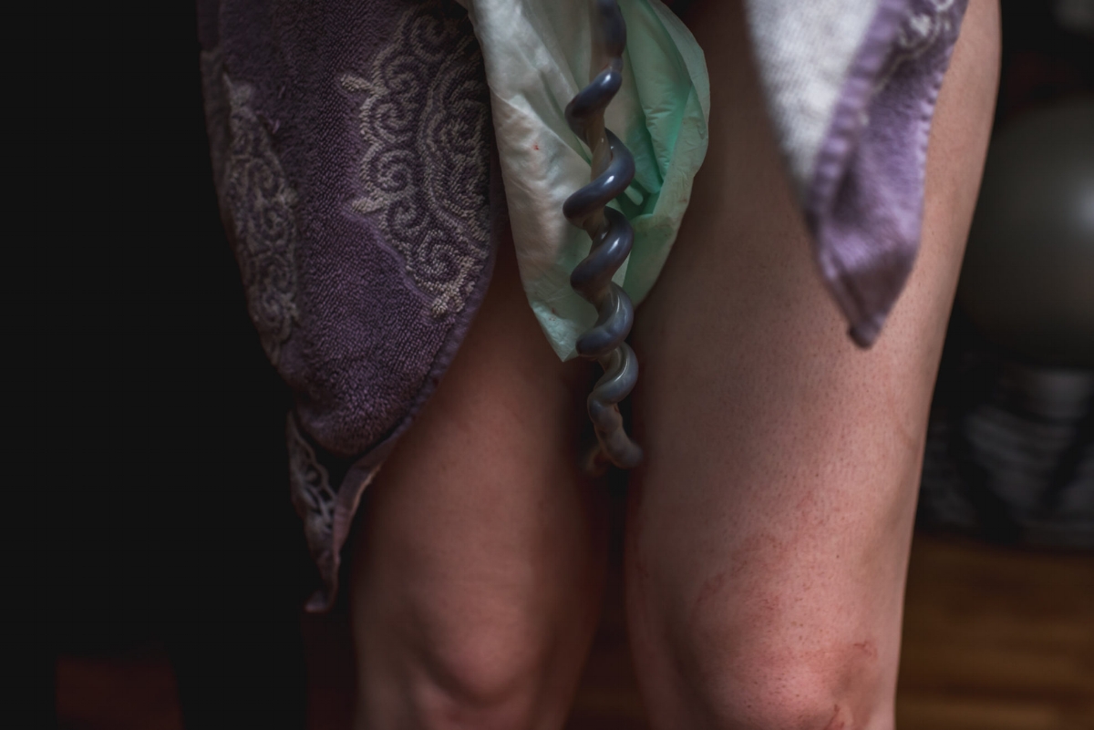 "Channel" - Laura Fifield This image is tack sharp. The aperture was open just enough to still provide us with a shallow depth of field, however still ensure that the subject was in focus. The colors are spot on. The shadow on the left side of the image is dark enough for a nice dramatic feel, but still shows detail at the edge of the towel. 