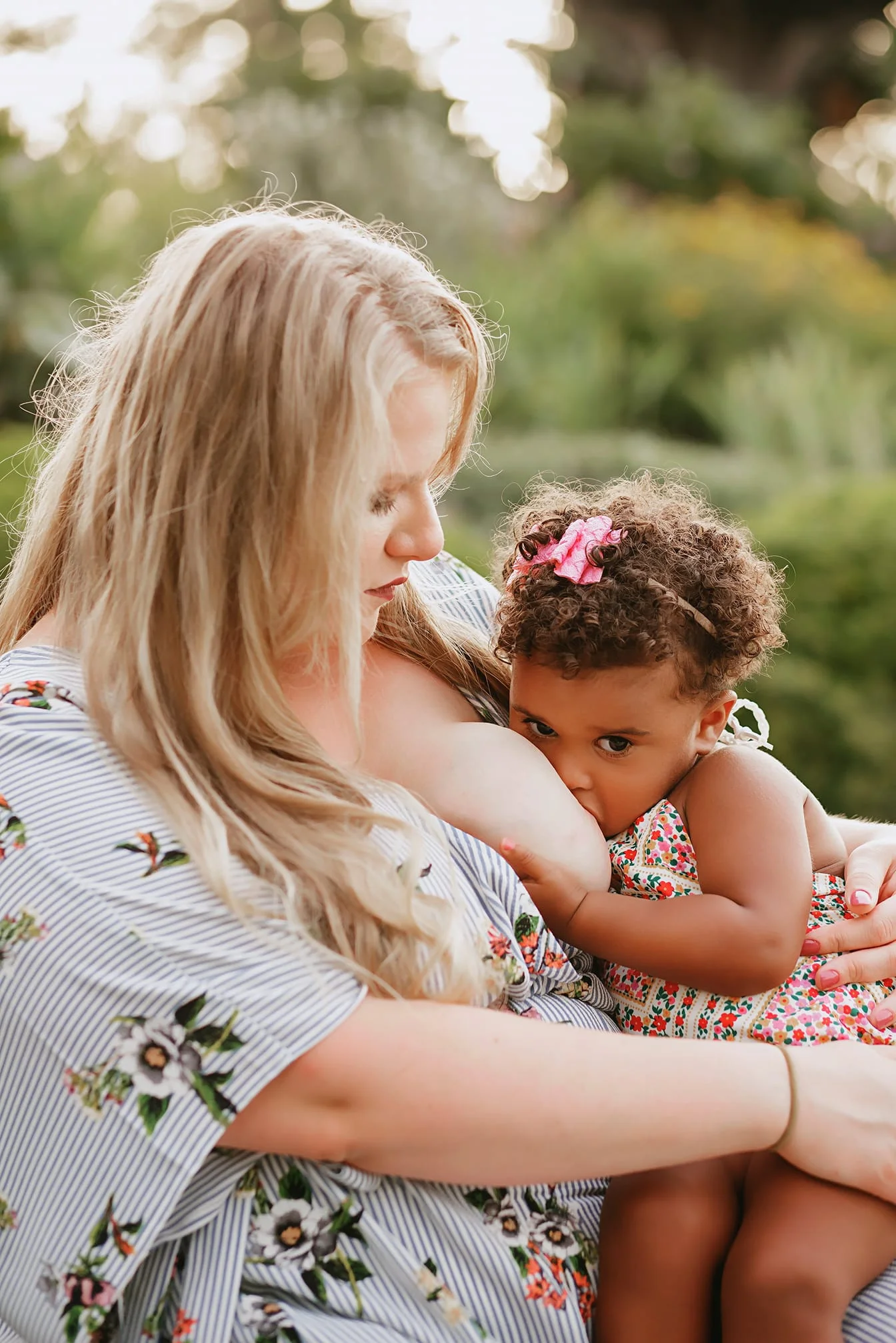 K. Ranae photography / www.kranaephotography.com This mama never thought in a million years that she would breastfeed her child. She was uneducated on the topic and young. A friend took the time to explain the benefits for both mom and baby and how amazing it is and changed her mind. Almost 2 years later and she's still nursing this sweet girl. The stigma behind breastfeeding can't end if we constantly cave to what makes society comfortable. I'm not here to make you comfortable or uncomfortable, I'm here to feed and nourish my baby. Don't like it? Move on.