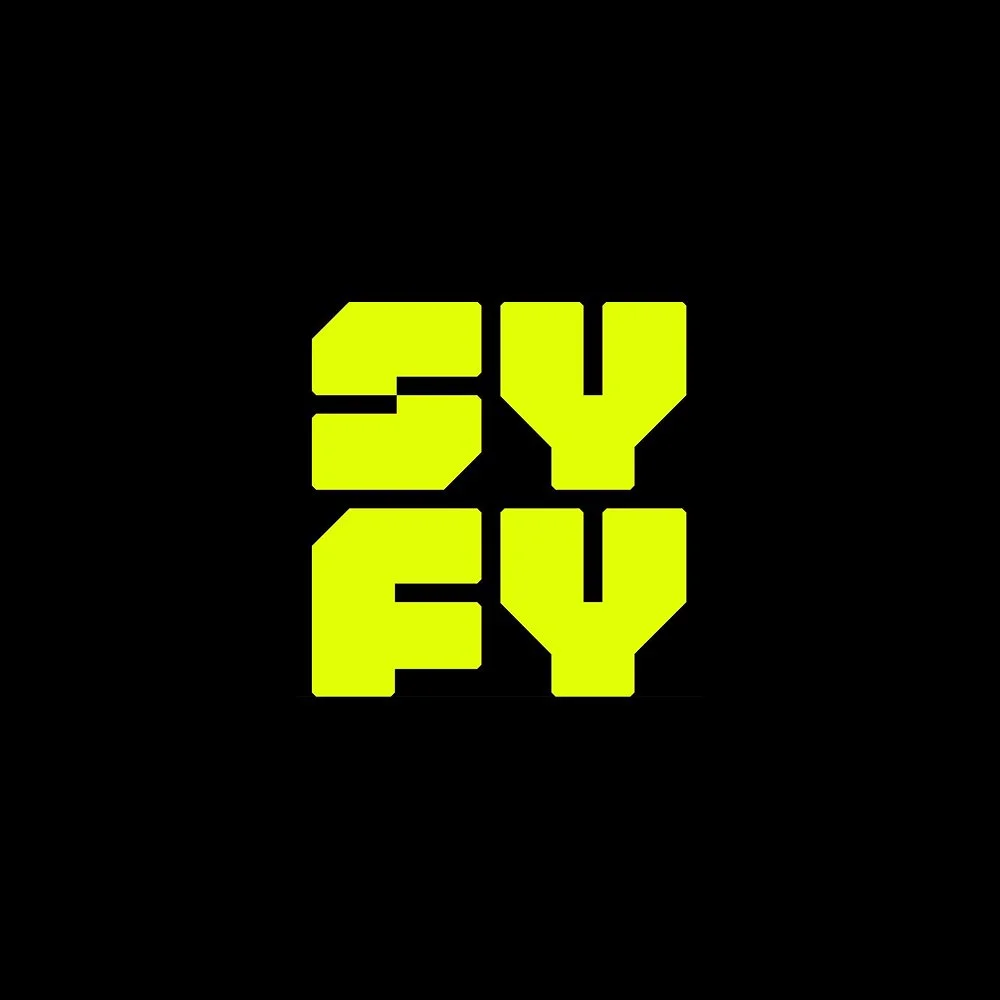 Bold yellow text spelling 'SYFY' on a black background.